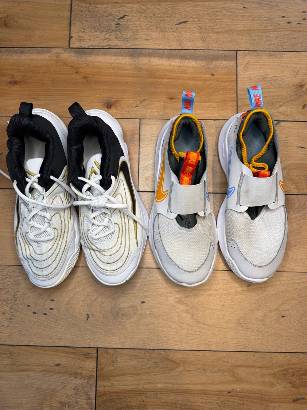 Two pair Nike sneakers Nike Kids' White with Gold & Orange Accents size 6